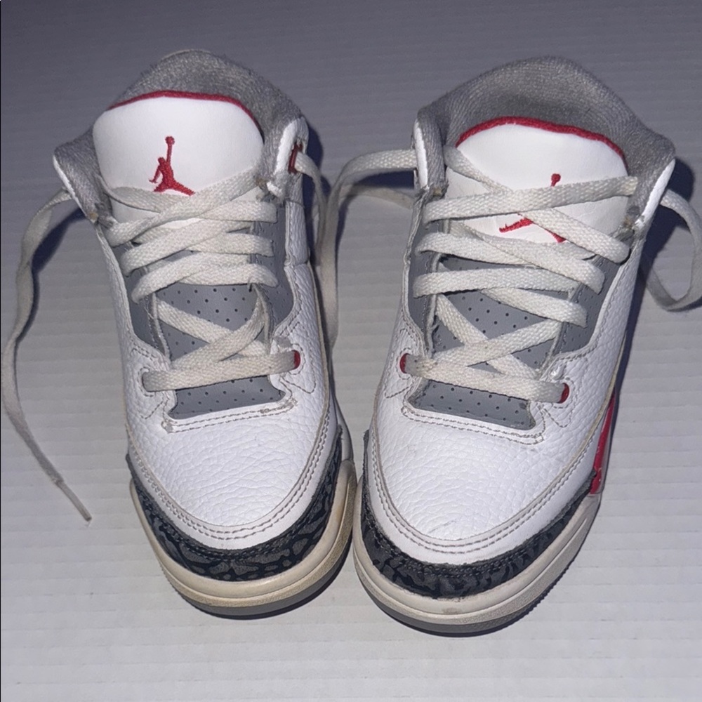 Jordan White and Gray Mid-Top Sneakers